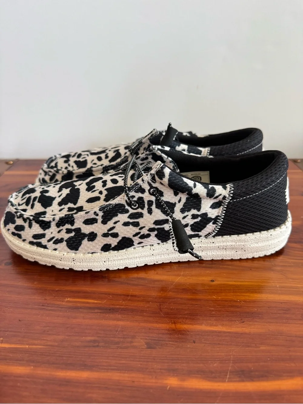 HEY DUDE Wally Funk Party Animal Men’s 10 Black White Cow Print NWT